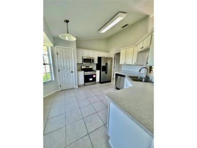 Move right into this beautifully updated 'Lilly' model home in on Stonecrest Golf and Club Club in Florida - for sale on GolfHomes.com, golf home, golf lot