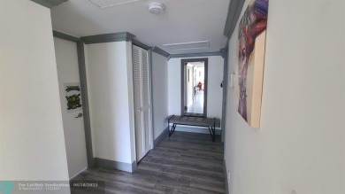 Experience South Florida living in this beautifully renovated on Palm-Aire Country Club and Resort - Palms in Florida - for sale on GolfHomes.com, golf home, golf lot