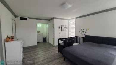 Experience South Florida living in this beautifully renovated on Palm-Aire Country Club and Resort - Palms in Florida - for sale on GolfHomes.com, golf home, golf lot