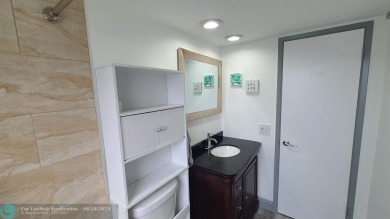 Experience South Florida living in this beautifully renovated on Palm-Aire Country Club and Resort - Palms in Florida - for sale on GolfHomes.com, golf home, golf lot