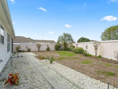 Enjoy your privacy in this well-maintained 3/2 Courtyard Villa on Cane Garden Golf Course in Florida - for sale on GolfHomes.com, golf home, golf lot
