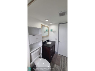 Experience South Florida living in this beautifully renovated on Palm-Aire Country Club and Resort - Palms in Florida - for sale on GolfHomes.com, golf home, golf lot