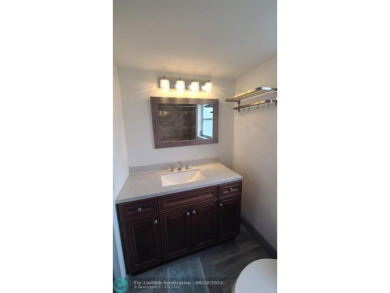 Experience South Florida living in this beautifully renovated on Palm-Aire Country Club and Resort - Palms in Florida - for sale on GolfHomes.com, golf home, golf lot