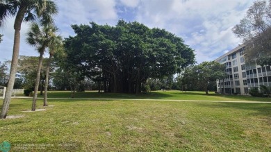 Experience South Florida living in this beautifully renovated on Palm-Aire Country Club and Resort - Palms in Florida - for sale on GolfHomes.com, golf home, golf lot