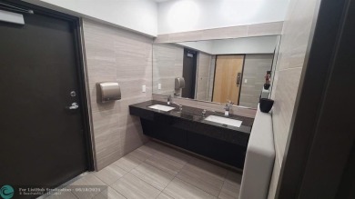 Experience South Florida living in this beautifully renovated on Palm-Aire Country Club and Resort - Palms in Florida - for sale on GolfHomes.com, golf home, golf lot