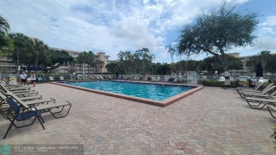 Experience South Florida living in this beautifully renovated on Palm-Aire Country Club and Resort - Palms in Florida - for sale on GolfHomes.com, golf home, golf lot