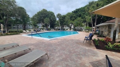 Experience South Florida living in this beautifully renovated on Palm-Aire Country Club and Resort - Palms in Florida - for sale on GolfHomes.com, golf home, golf lot