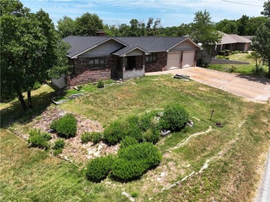 This beautiful home is located on the crest of the Ozark on Holiday Island Golf Course in Arkansas - for sale on GolfHomes.com, golf home, golf lot