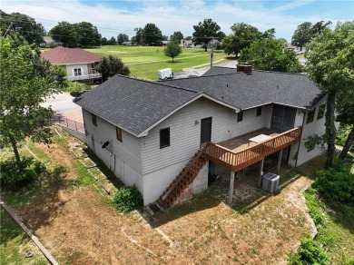 This beautiful home is located on the crest of the Ozark on Holiday Island Golf Course in Arkansas - for sale on GolfHomes.com, golf home, golf lot