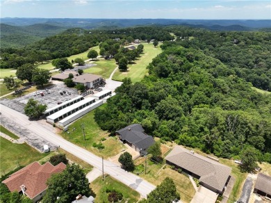 This beautiful home is located on the crest of the Ozark on Holiday Island Golf Course in Arkansas - for sale on GolfHomes.com, golf home, golf lot