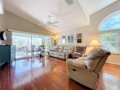 Discover tranquil living with a water view in Pinehurst Village! on Palm Aire Country Club of Sarasota in Florida - for sale on GolfHomes.com, golf home, golf lot