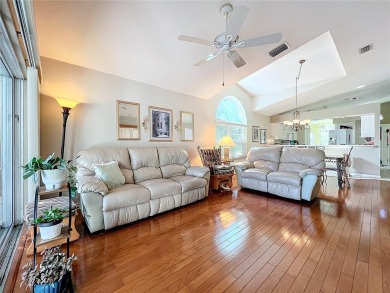 Discover tranquil living with a water view in Pinehurst Village! on Palm Aire Country Club of Sarasota in Florida - for sale on GolfHomes.com, golf home, golf lot