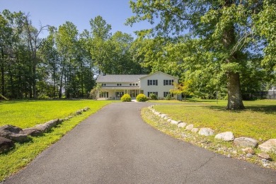 A rare opportunity! This beautiful Colonial nestled on a on Manhattan Woods Golf Club in New York - for sale on GolfHomes.com, golf home, golf lot