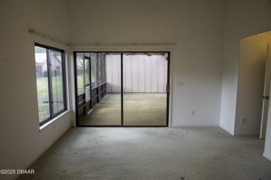 A 2 Bedroom with a Den/2 Bath end unit in the Woodside on Spruce Creek Golf Club in Florida - for sale on GolfHomes.com, golf home, golf lot