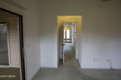 A 2 Bedroom with a Den/2 Bath end unit in the Woodside on Spruce Creek Golf Club in Florida - for sale on GolfHomes.com, golf home, golf lot