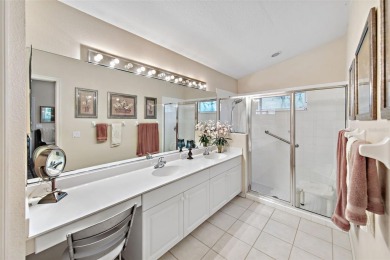 Discover tranquil living with a water view in Pinehurst Village! on Palm Aire Country Club of Sarasota in Florida - for sale on GolfHomes.com, golf home, golf lot