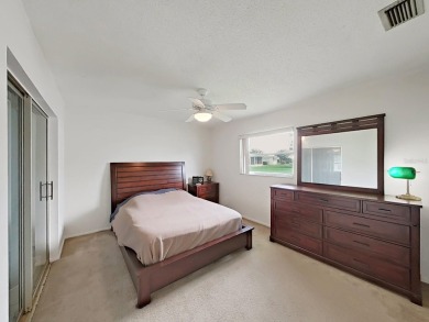 Welcome to your sunny Florida retreat! This charming, move-in on Mainlands Golf Club in Florida - for sale on GolfHomes.com, golf home, golf lot
