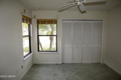 A 2 Bedroom with a Den/2 Bath end unit in the Woodside on Spruce Creek Golf Club in Florida - for sale on GolfHomes.com, golf home, golf lot
