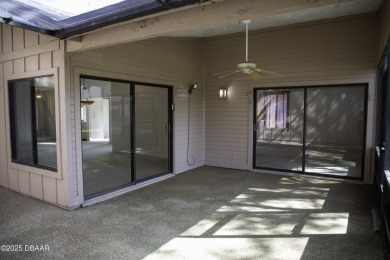 A 2 Bedroom with a Den/2 Bath end unit in the Woodside on Spruce Creek Golf Club in Florida - for sale on GolfHomes.com, golf home, golf lot