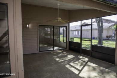 A 2 Bedroom with a Den/2 Bath end unit in the Woodside on Spruce Creek Golf Club in Florida - for sale on GolfHomes.com, golf home, golf lot