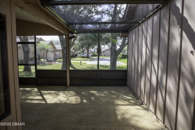 A 2 Bedroom with a Den/2 Bath end unit in the Woodside on Spruce Creek Golf Club in Florida - for sale on GolfHomes.com, golf home, golf lot