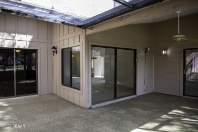 A 2 Bedroom with a Den/2 Bath end unit in the Woodside on Spruce Creek Golf Club in Florida - for sale on GolfHomes.com, golf home, golf lot