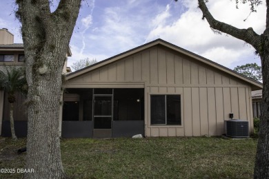 A 2 Bedroom with a Den/2 Bath end unit in the Woodside on Spruce Creek Golf Club in Florida - for sale on GolfHomes.com, golf home, golf lot