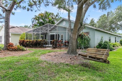 Discover tranquil living with a water view in Pinehurst Village! on Palm Aire Country Club of Sarasota in Florida - for sale on GolfHomes.com, golf home, golf lot