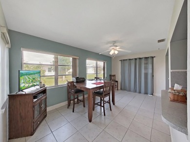 Welcome to your sunny Florida retreat! This charming, move-in on Mainlands Golf Club in Florida - for sale on GolfHomes.com, golf home, golf lot