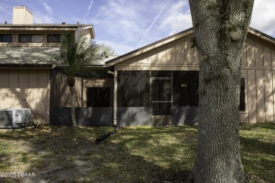 A 2 Bedroom with a Den/2 Bath end unit in the Woodside on Spruce Creek Golf Club in Florida - for sale on GolfHomes.com, golf home, golf lot