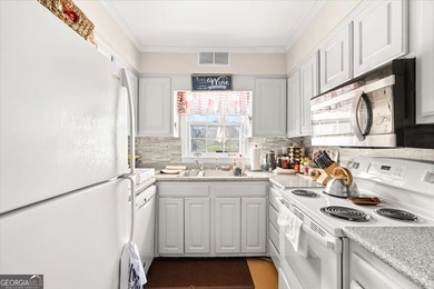 Live directly on the golf course in this spacious two-story on Cross Creek Golf Course in Georgia - for sale on GolfHomes.com, golf home, golf lot