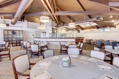 A 2 Bedroom with a Den/2 Bath end unit in the Woodside on Spruce Creek Golf Club in Florida - for sale on GolfHomes.com, golf home, golf lot