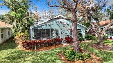 Discover tranquil living with a water view in Pinehurst Village! on Palm Aire Country Club of Sarasota in Florida - for sale on GolfHomes.com, golf home, golf lot