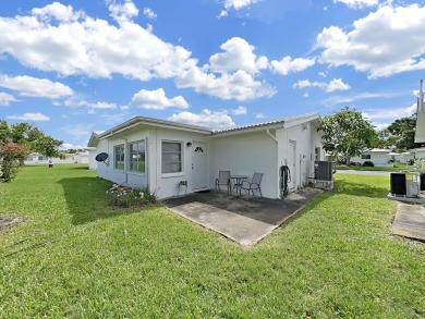 Welcome to your sunny Florida retreat! This charming, move-in on Mainlands Golf Club in Florida - for sale on GolfHomes.com, golf home, golf lot