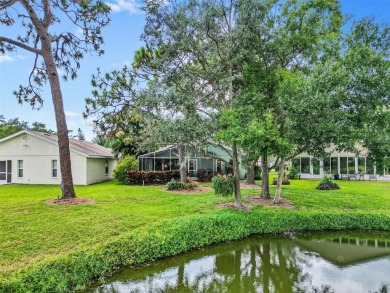 Discover tranquil living with a water view in Pinehurst Village! on Palm Aire Country Club of Sarasota in Florida - for sale on GolfHomes.com, golf home, golf lot