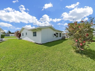 Welcome to your sunny Florida retreat! This charming, move-in on Mainlands Golf Club in Florida - for sale on GolfHomes.com, golf home, golf lot