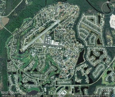 A 2 Bedroom with a Den/2 Bath end unit in the Woodside on Spruce Creek Golf Club in Florida - for sale on GolfHomes.com, golf home, golf lot