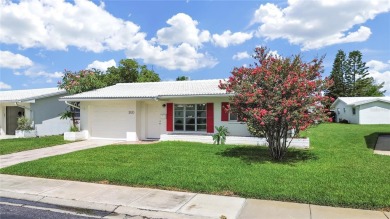 Welcome to your sunny Florida retreat! This charming, move-in on Mainlands Golf Club in Florida - for sale on GolfHomes.com, golf home, golf lot