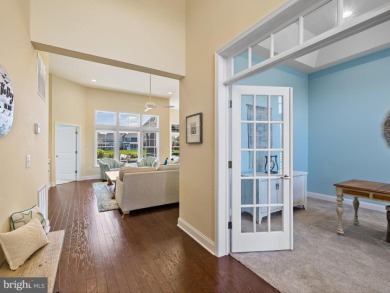This coastal-style contemporary home is perfectly positioned on on The Peninsula Golf and Country Club in Delaware - for sale on GolfHomes.com, golf home, golf lot