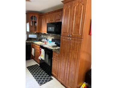 Don't miss this incredible opportunity to own a spacious on Sunrise Lakes Phase IV Golf Course in Florida - for sale on GolfHomes.com, golf home, golf lot