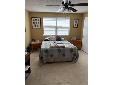 Don't miss this incredible opportunity to own a spacious on Sunrise Lakes Phase IV Golf Course in Florida - for sale on GolfHomes.com, golf home, golf lot
