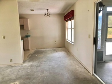 Welcome to this Charming 2 bedroom, 2 bath with a spacious 2 car on Tierra Del Sol Golf and Country Club in Florida - for sale on GolfHomes.com, golf home, golf lot