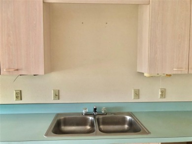 Welcome to this Charming 2 bedroom, 2 bath with a spacious 2 car on Tierra Del Sol Golf and Country Club in Florida - for sale on GolfHomes.com, golf home, golf lot