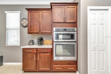 Experience the perfect blend of luxury, comfort, and convenience on Candler Hills Golf and Country Club in Florida - for sale on GolfHomes.com, golf home, golf lot