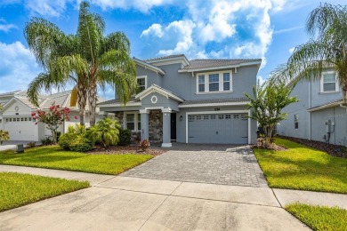 Don't miss out on this stunning 5-bed, 4.5-bath, 3,800+ sq ft on The Oasis Club at Champions Gate in Florida - for sale on GolfHomes.com, golf home, golf lot
