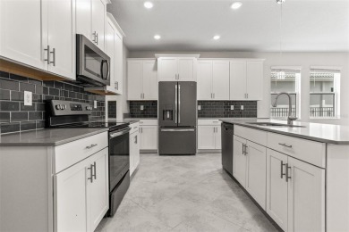 Don't miss out on this stunning 5-bed, 4.5-bath, 3,800+ sq ft on The Oasis Club at Champions Gate in Florida - for sale on GolfHomes.com, golf home, golf lot