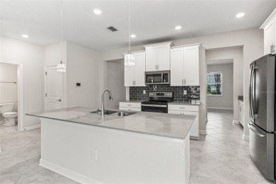 Don't miss out on this stunning 5-bed, 4.5-bath, 3,800+ sq ft on The Oasis Club at Champions Gate in Florida - for sale on GolfHomes.com, golf home, golf lot