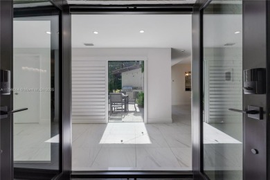 Modern Gables Oasis - this move-in ready home offers serenity on Riviera Country Club in Florida - for sale on GolfHomes.com, golf home, golf lot