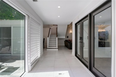 Modern Gables Oasis - this move-in ready home offers serenity on Riviera Country Club in Florida - for sale on GolfHomes.com, golf home, golf lot