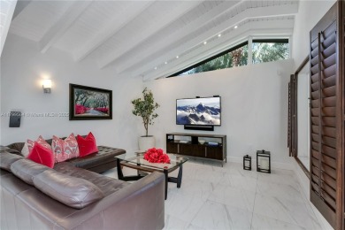 Modern Gables Oasis - this move-in ready home offers serenity on Riviera Country Club in Florida - for sale on GolfHomes.com, golf home, golf lot